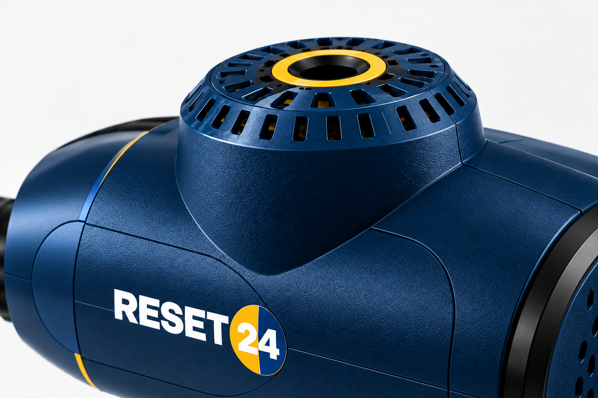 Detalle del cuerpo y la rejilla de ventilación de la pistola de masaje RESET24